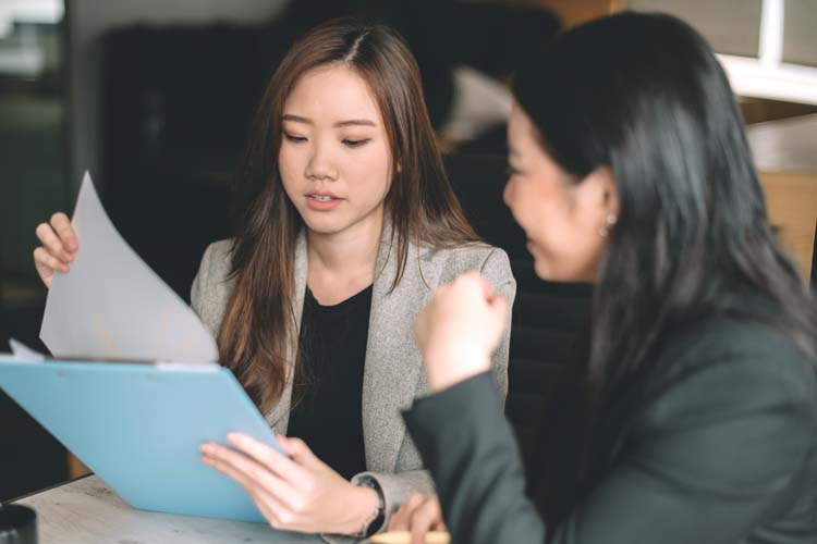 hr employee evaluating documents