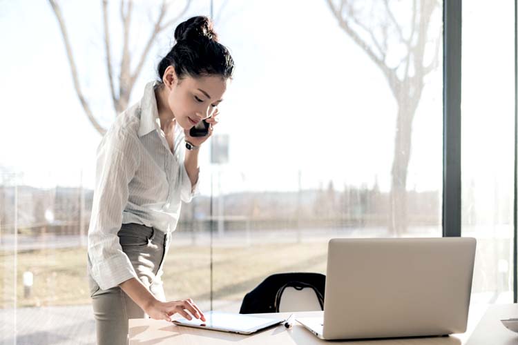 hr employee answering and communicating on the telephone