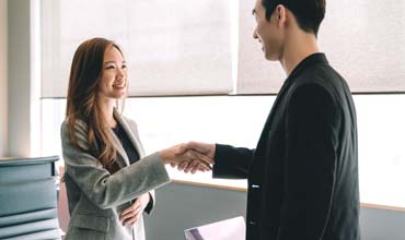 hr professionals shaking hands