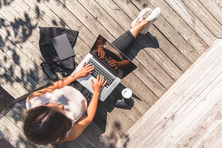 MBA student studying in the open area.