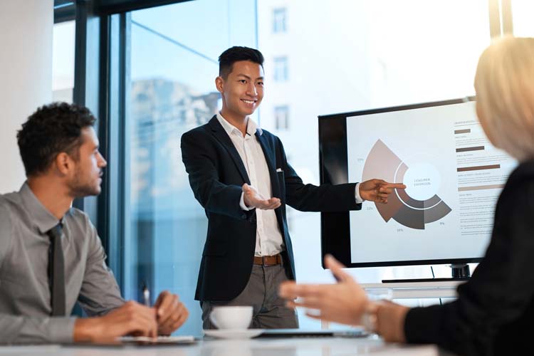 An Asian businessman having a presentation.