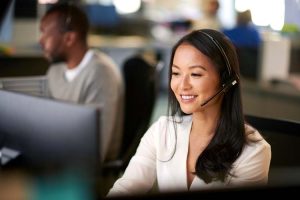 Call center worker provides customer service and resolves inquiries and issues.