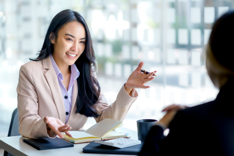 Human resources manager conducts interviews with current applicants